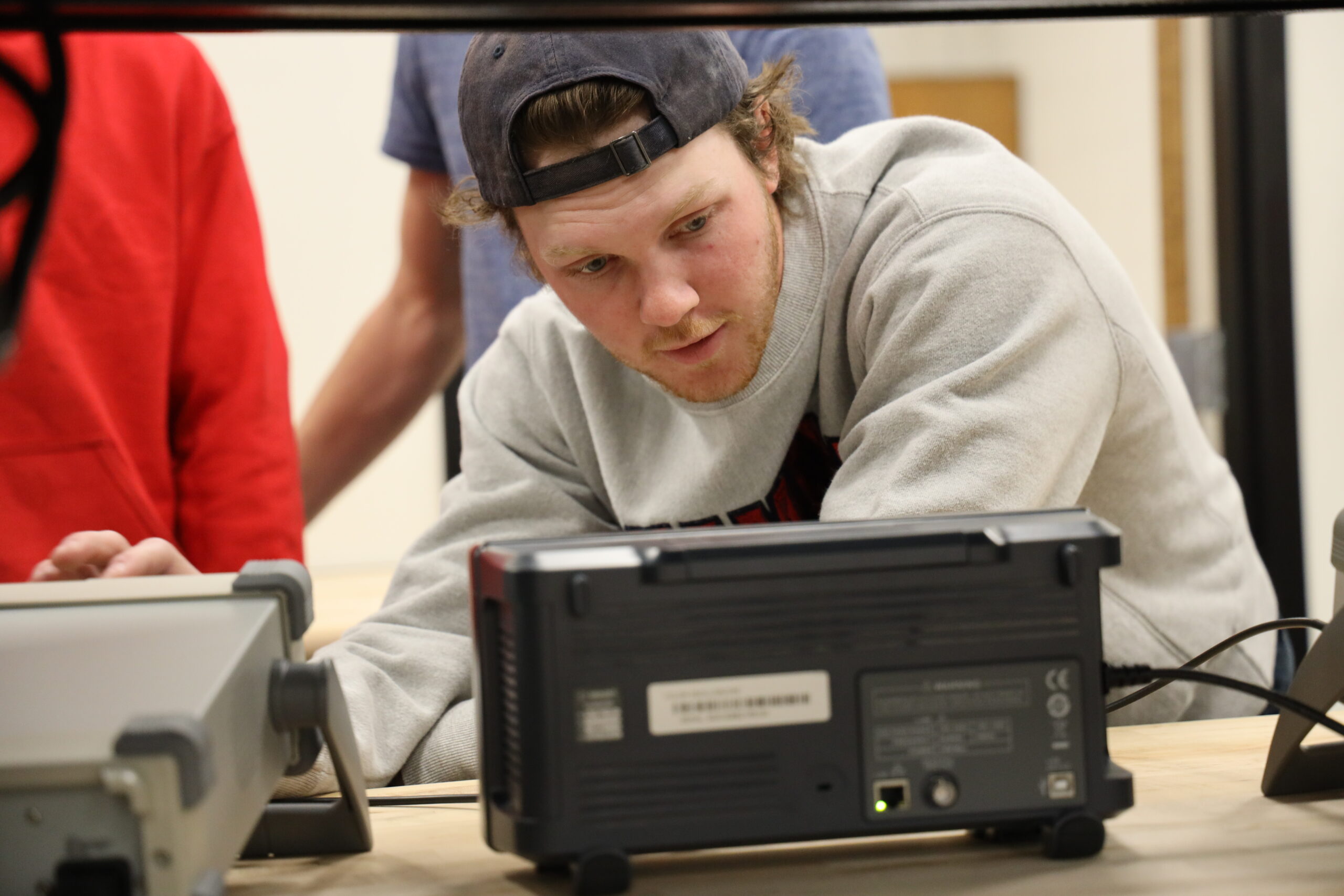 Student working with equipment