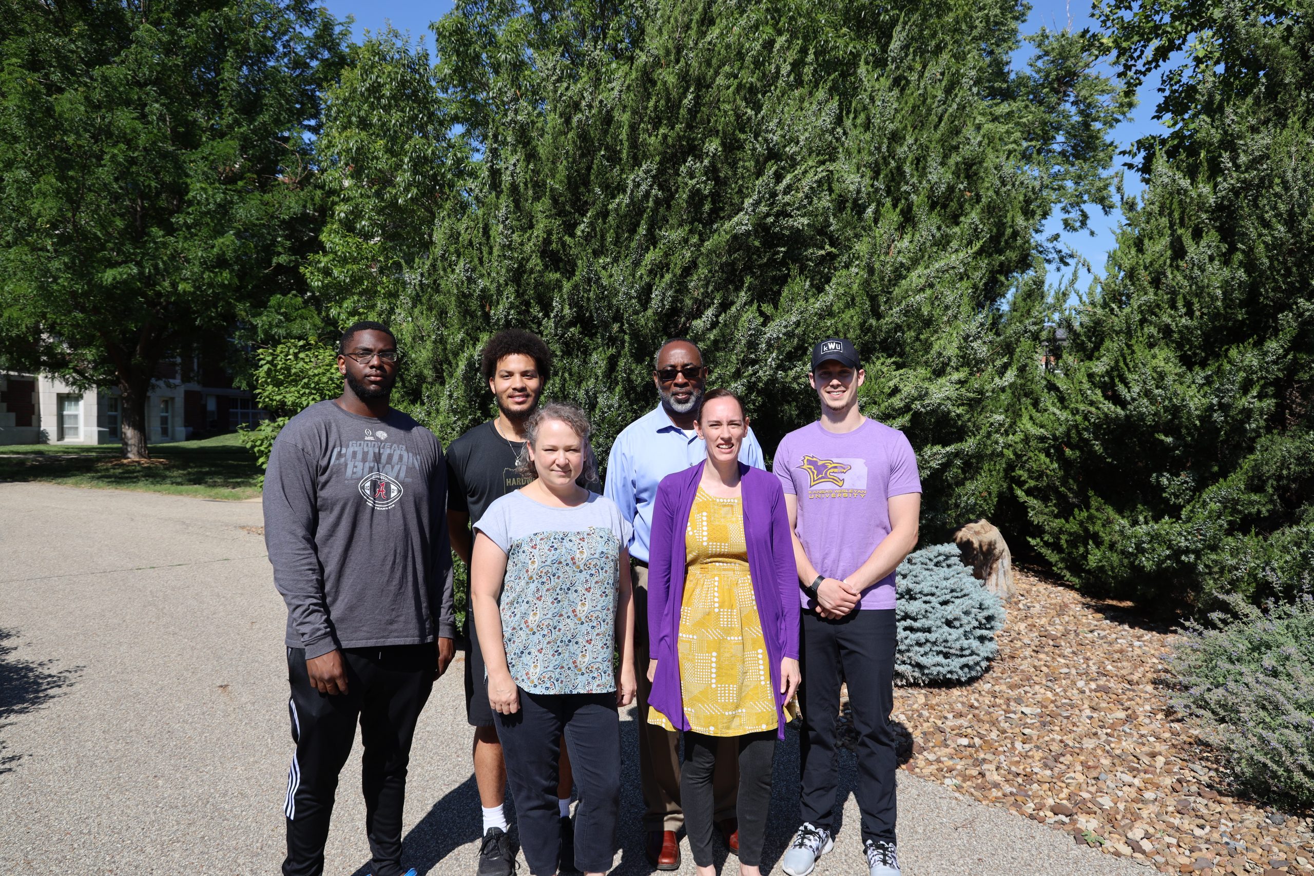 Group of people near Coyote statue