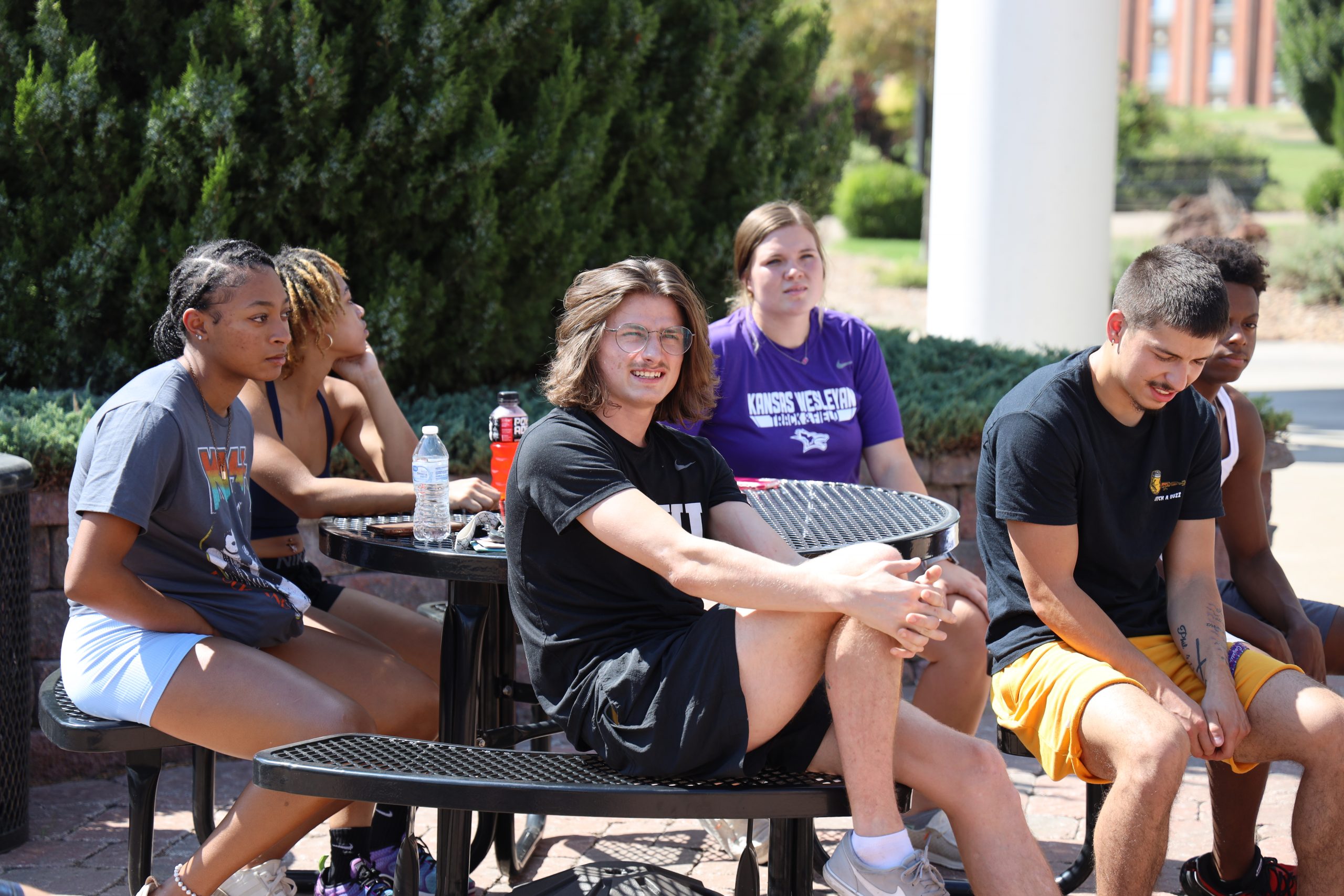 Group of students at table by SAC