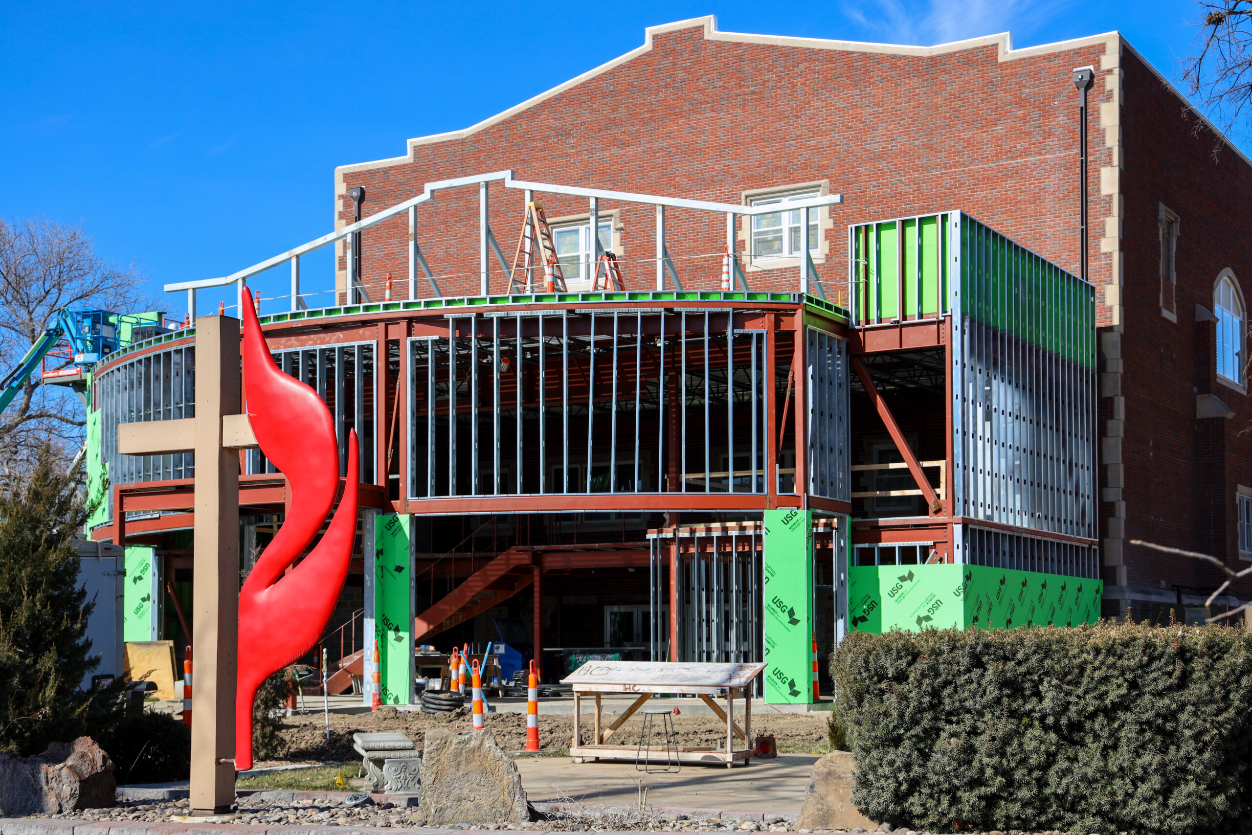 Construction on front of building with Methodist logo showing