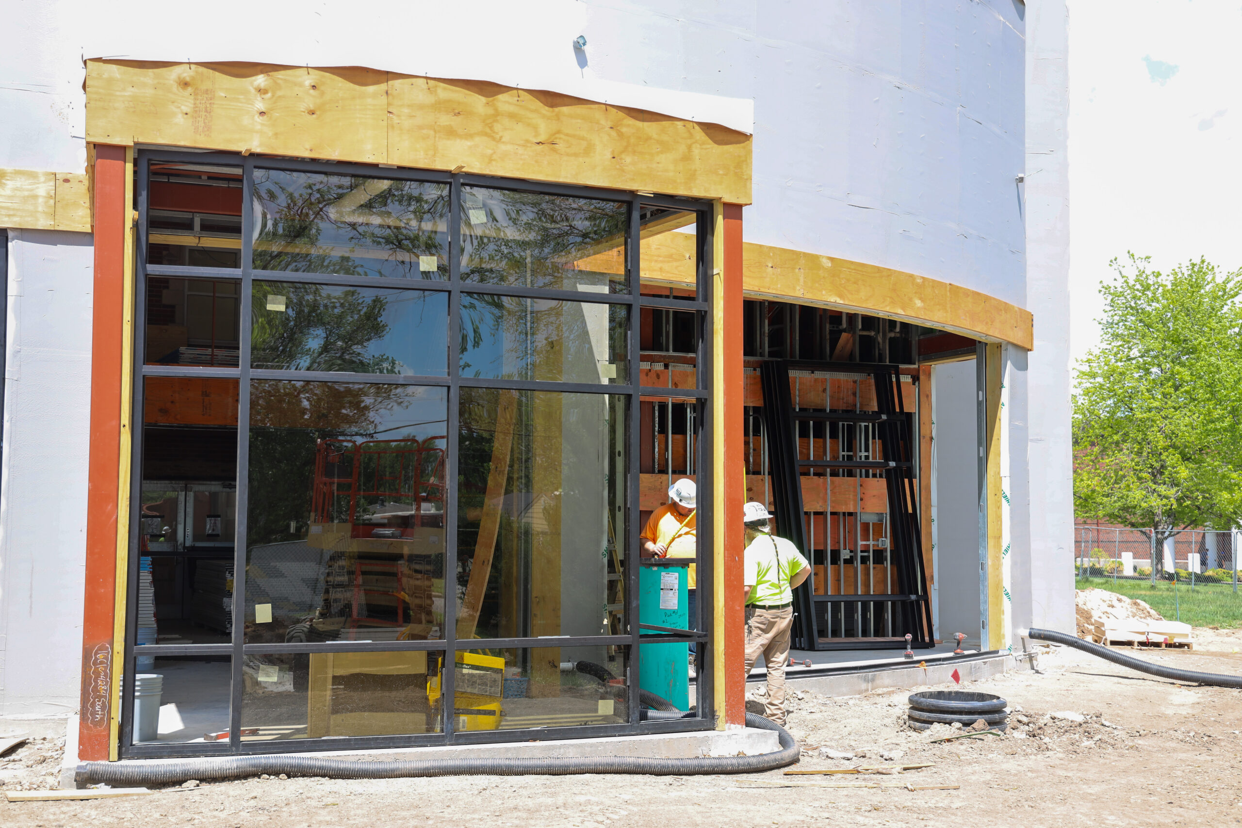 Glass being installed in front of Pioneer Hall