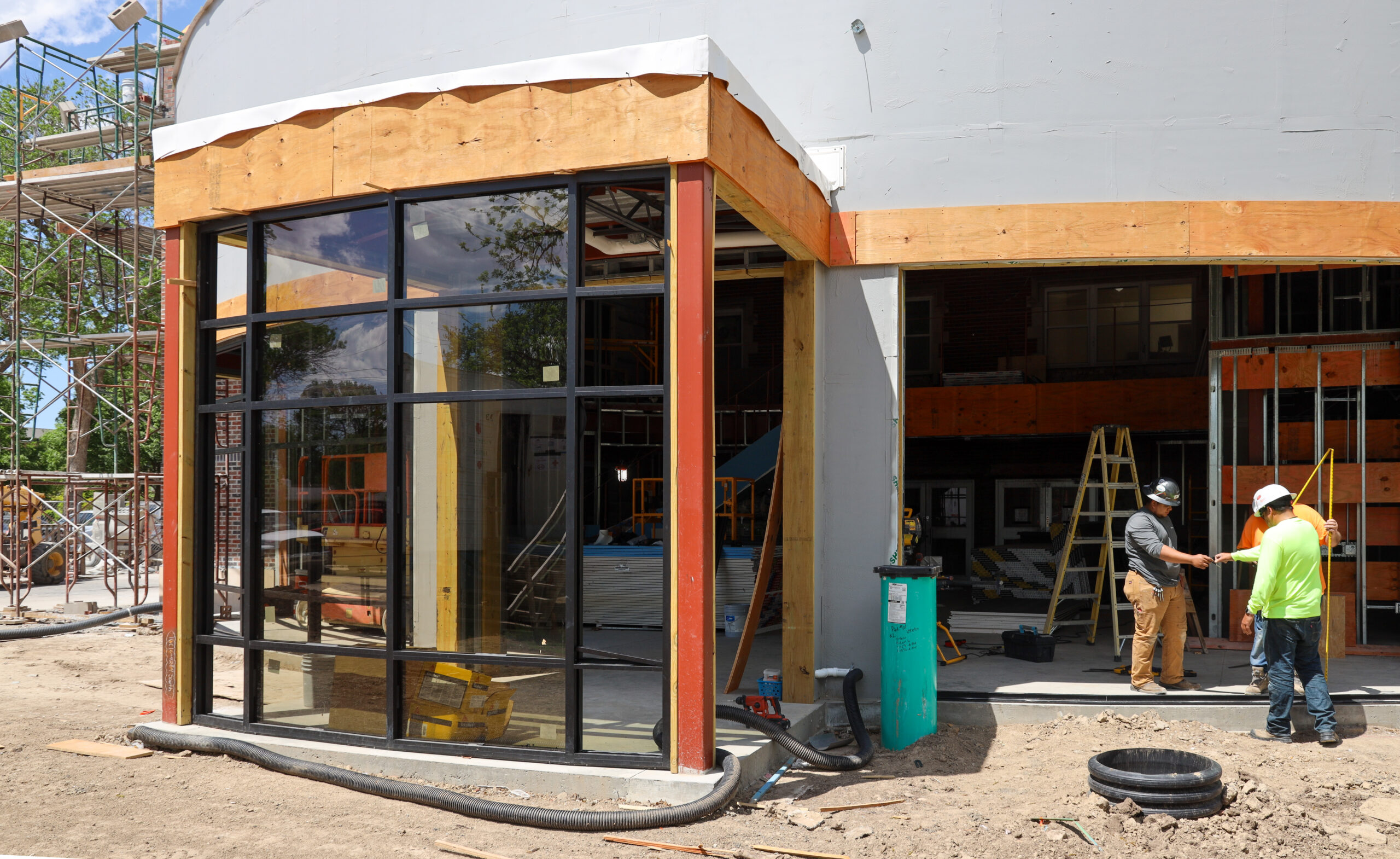 Glass being installed in front of Pioneer Hall