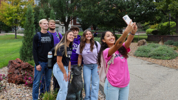 A group of students take a selfie