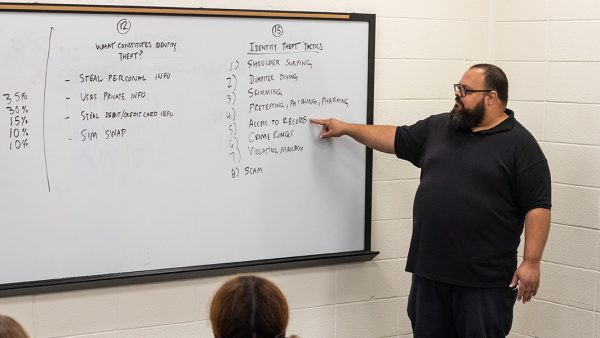 Professor instructing in classroom