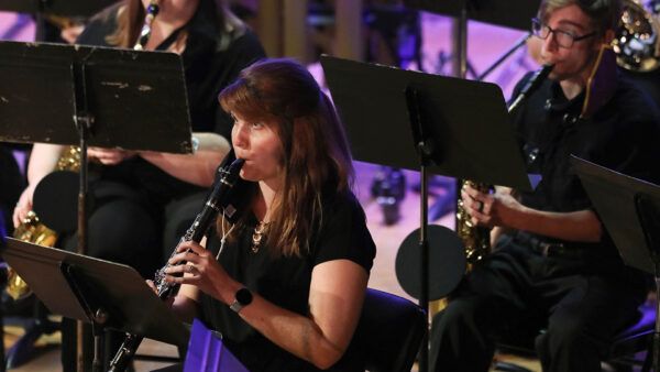 Student playing music in a concert