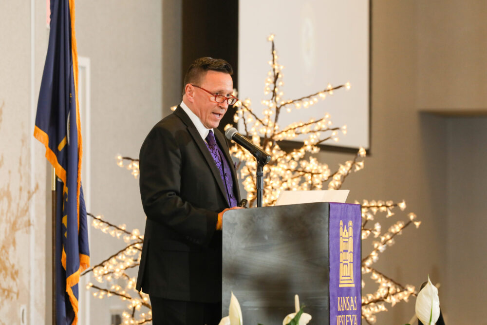 Man speaking at podium