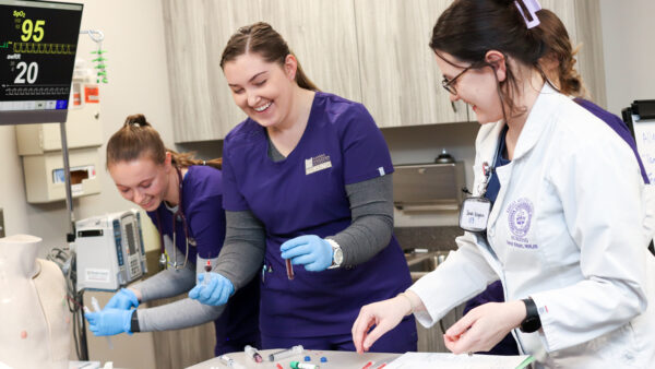 Nursing teacher giving instruction