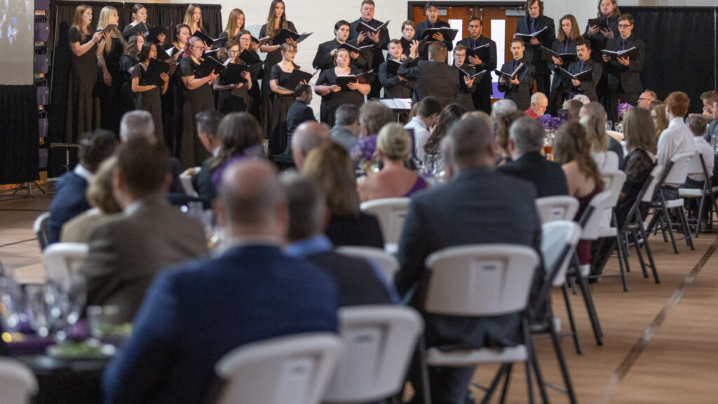 Group of students singing at 2024 Gala