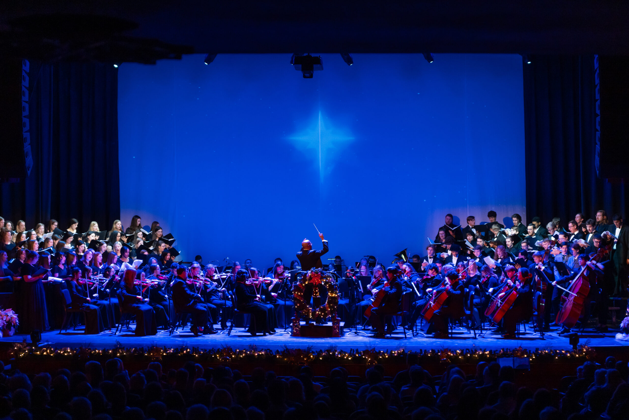 Wide angle shot of musicians at Christmas by Candlelight
