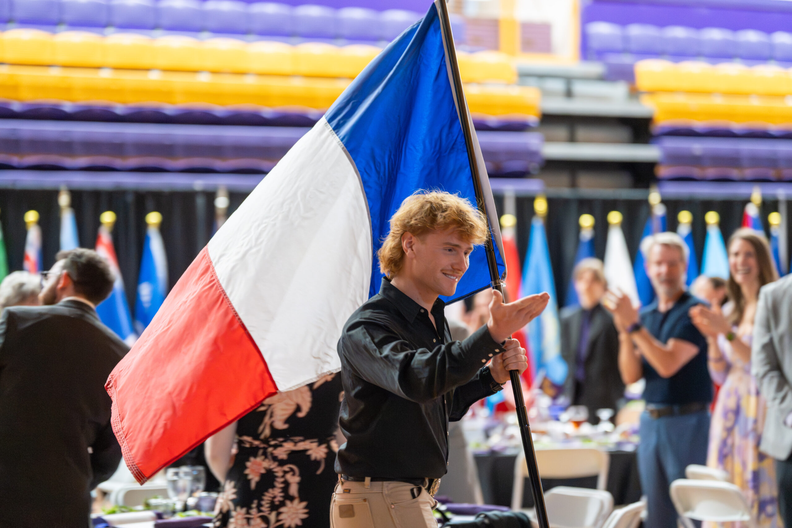 Man holds French flag