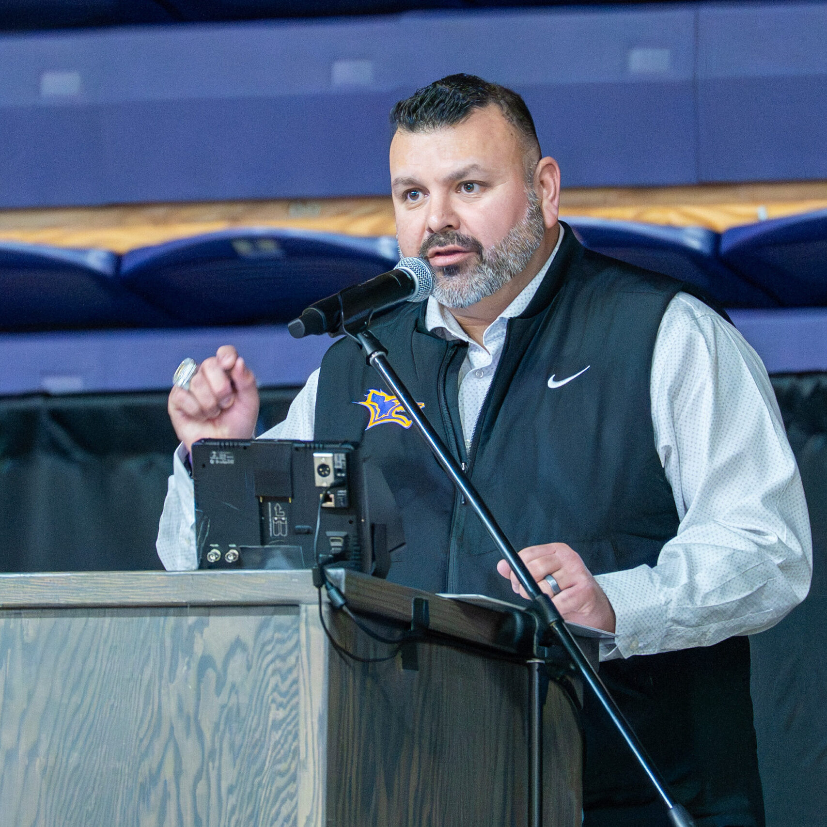 Man talking behind podium
