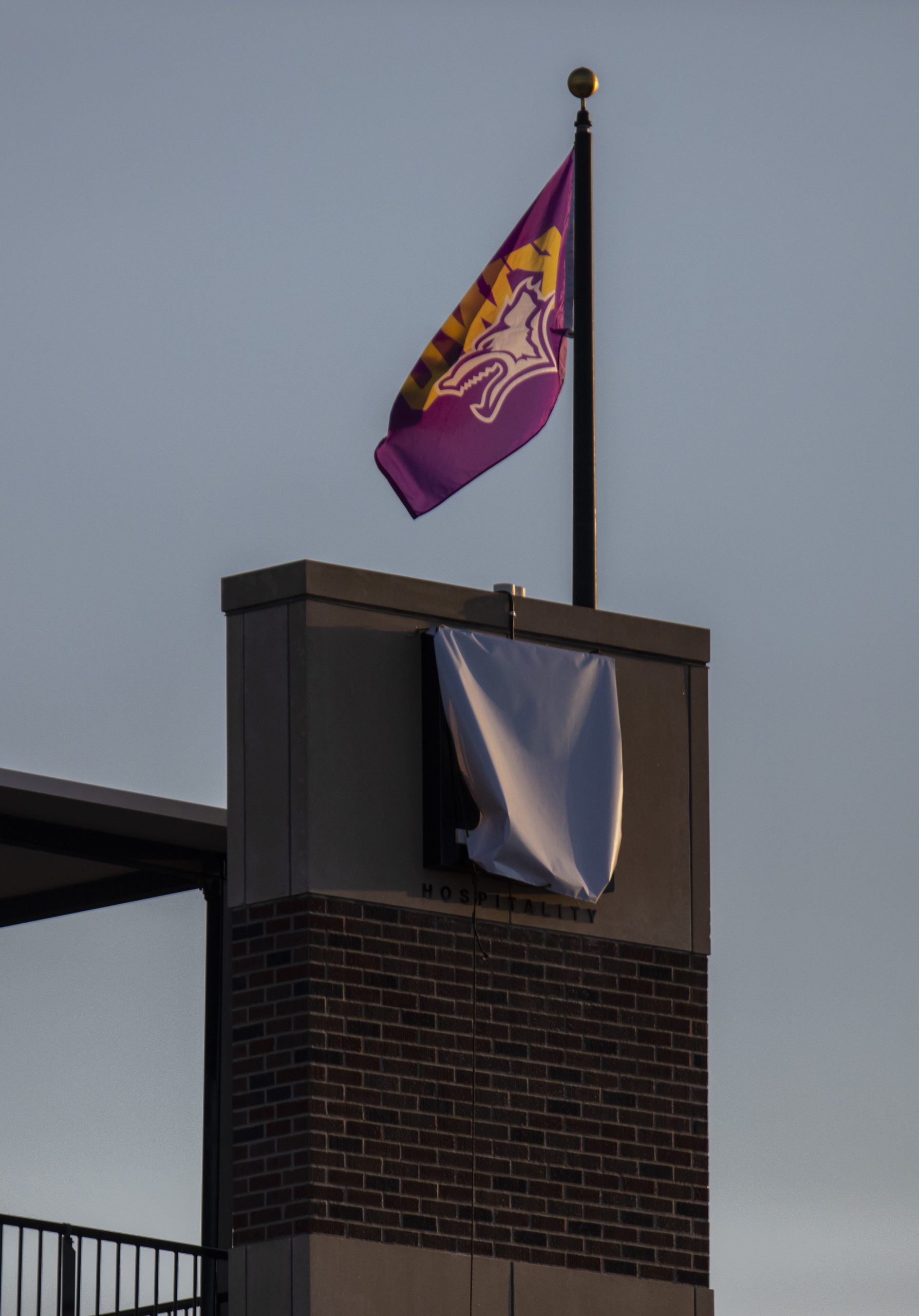 Sign on outside of stadium - covered