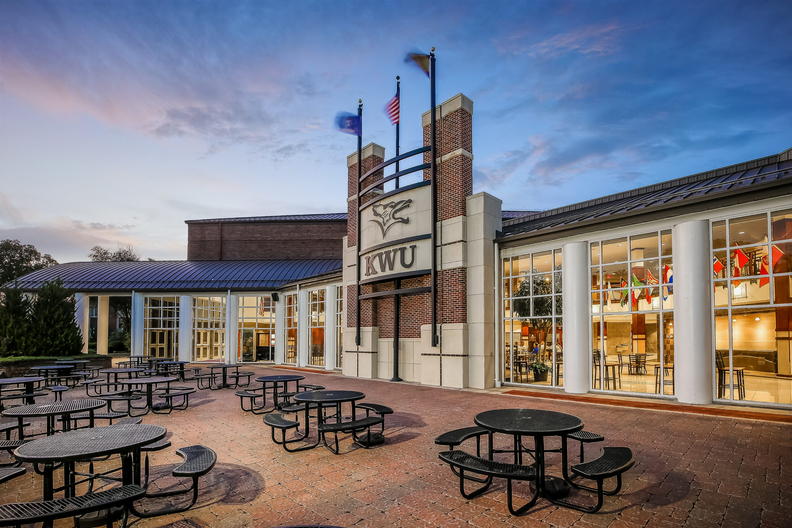 Angled shot of student activities center at sunset