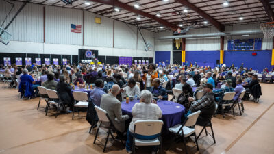 Large group in auditorium seated