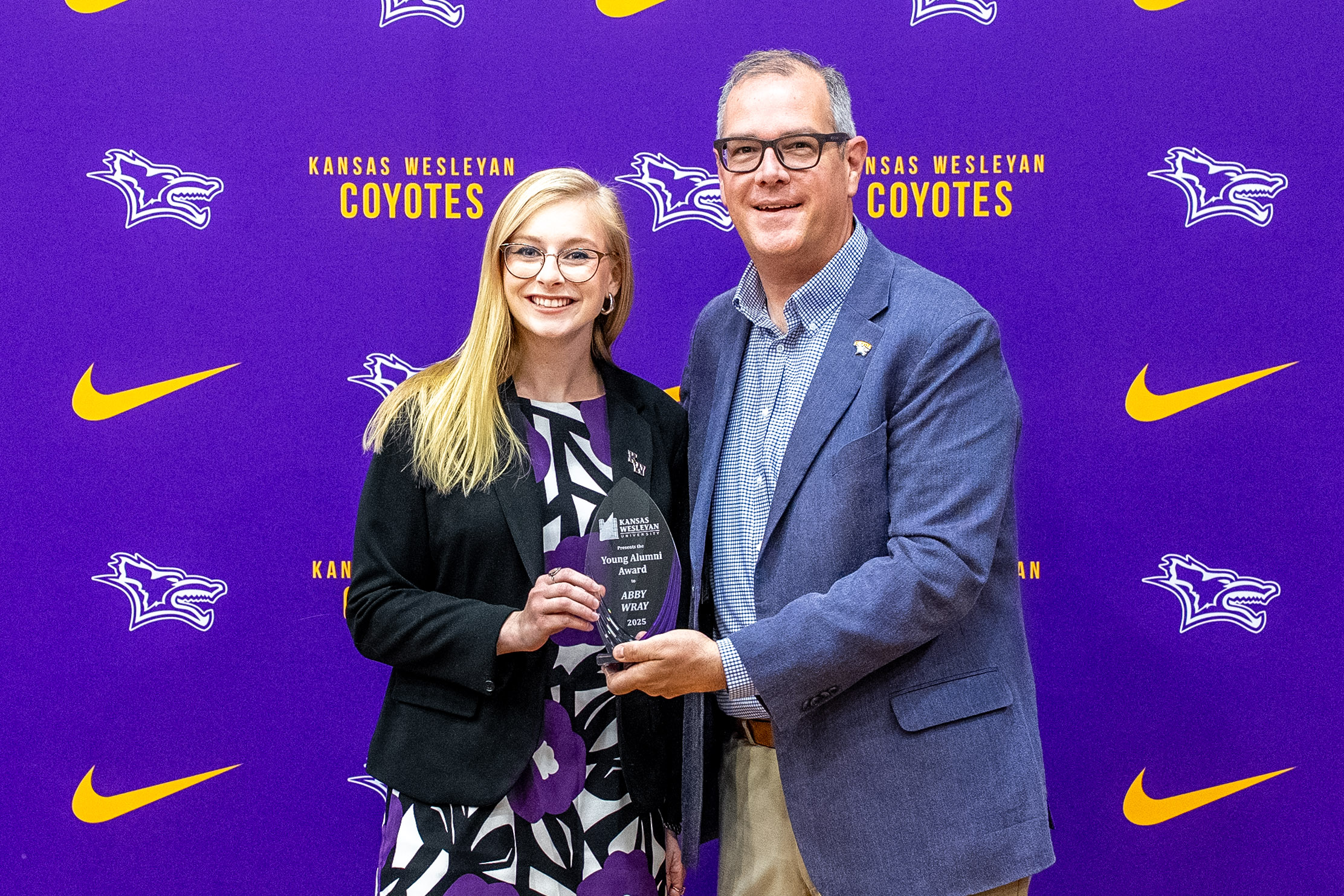 Man presenting award