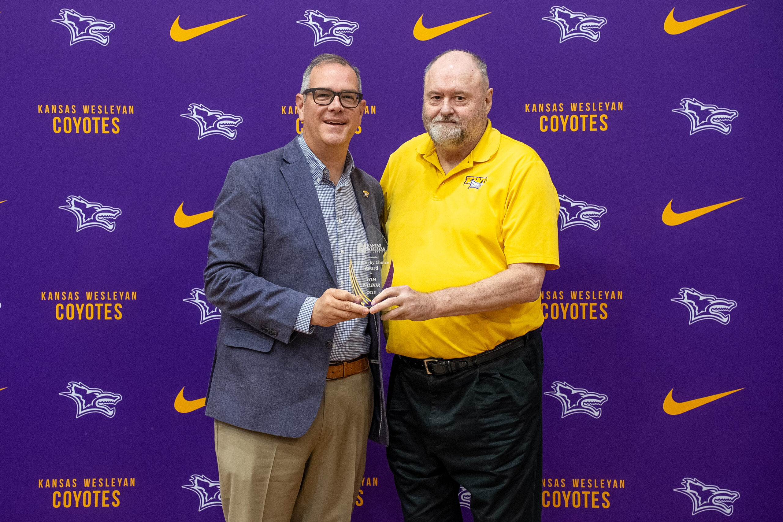 Man presenting award