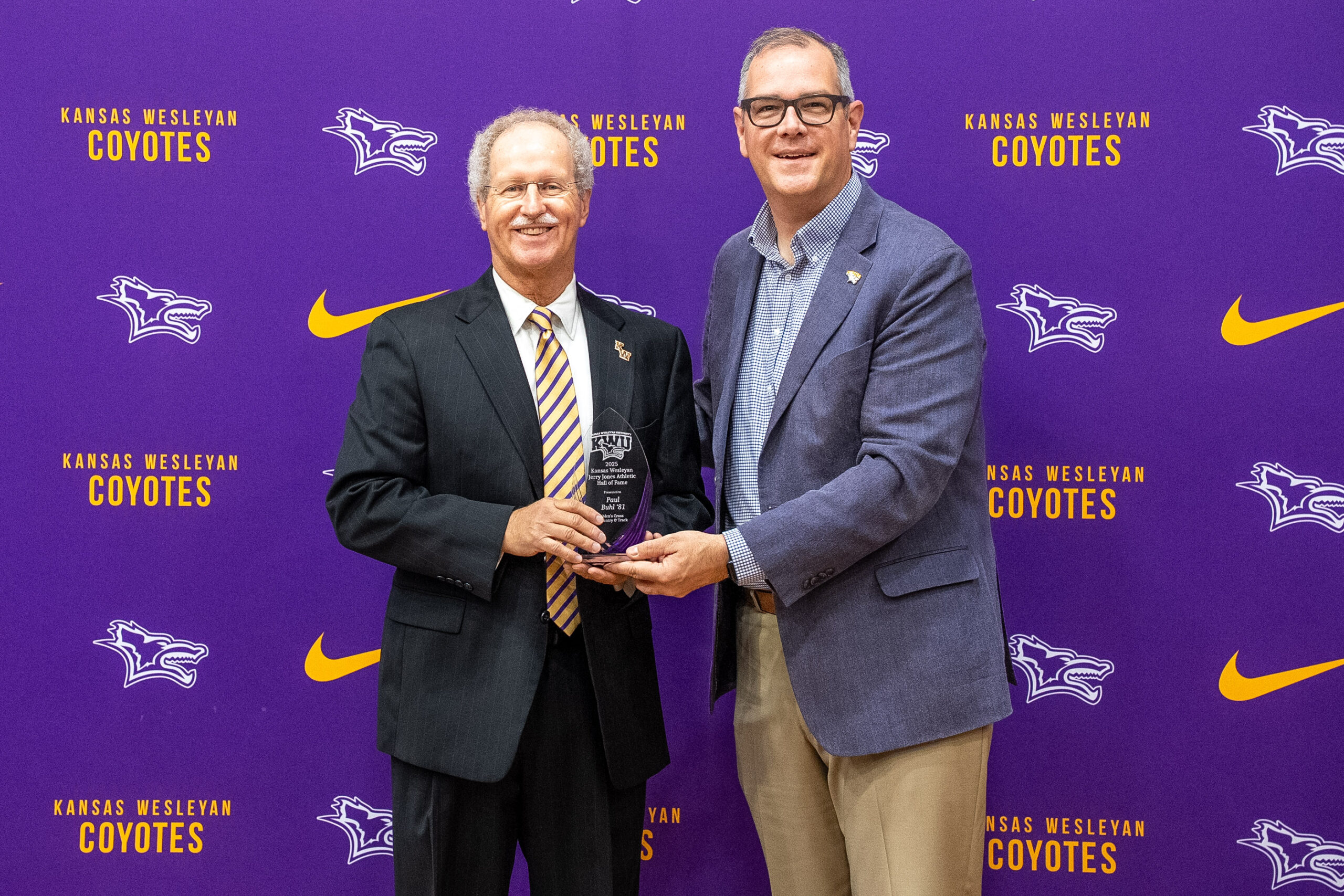 Man presenting award