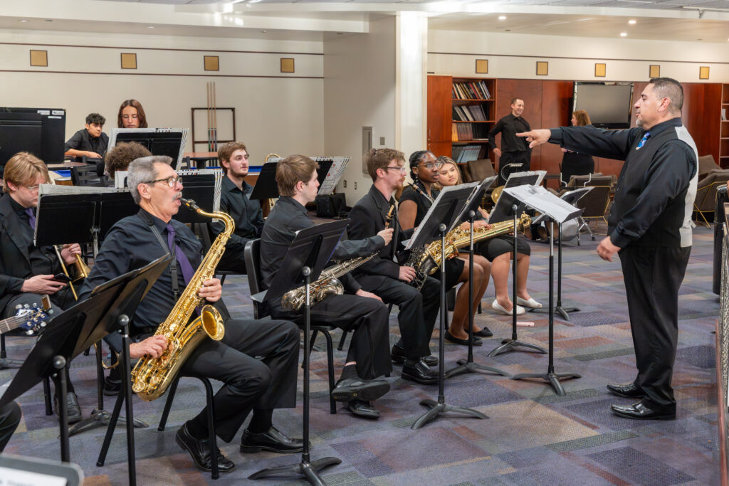 Band members playing saxophones