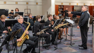 Band members playing saxophones