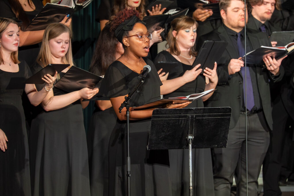 Group of individuals singing