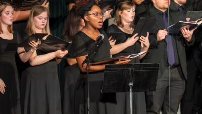 Group of individuals singing
