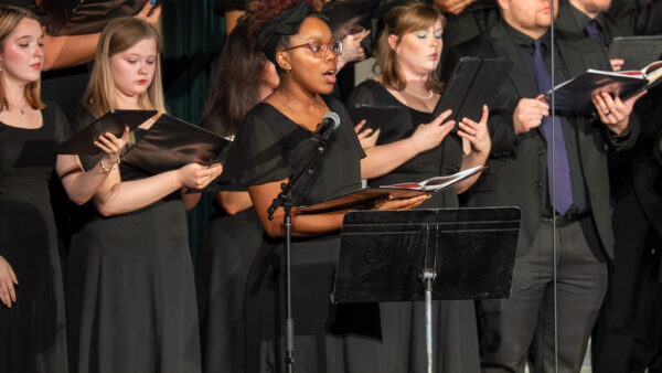 Group of individuals singing