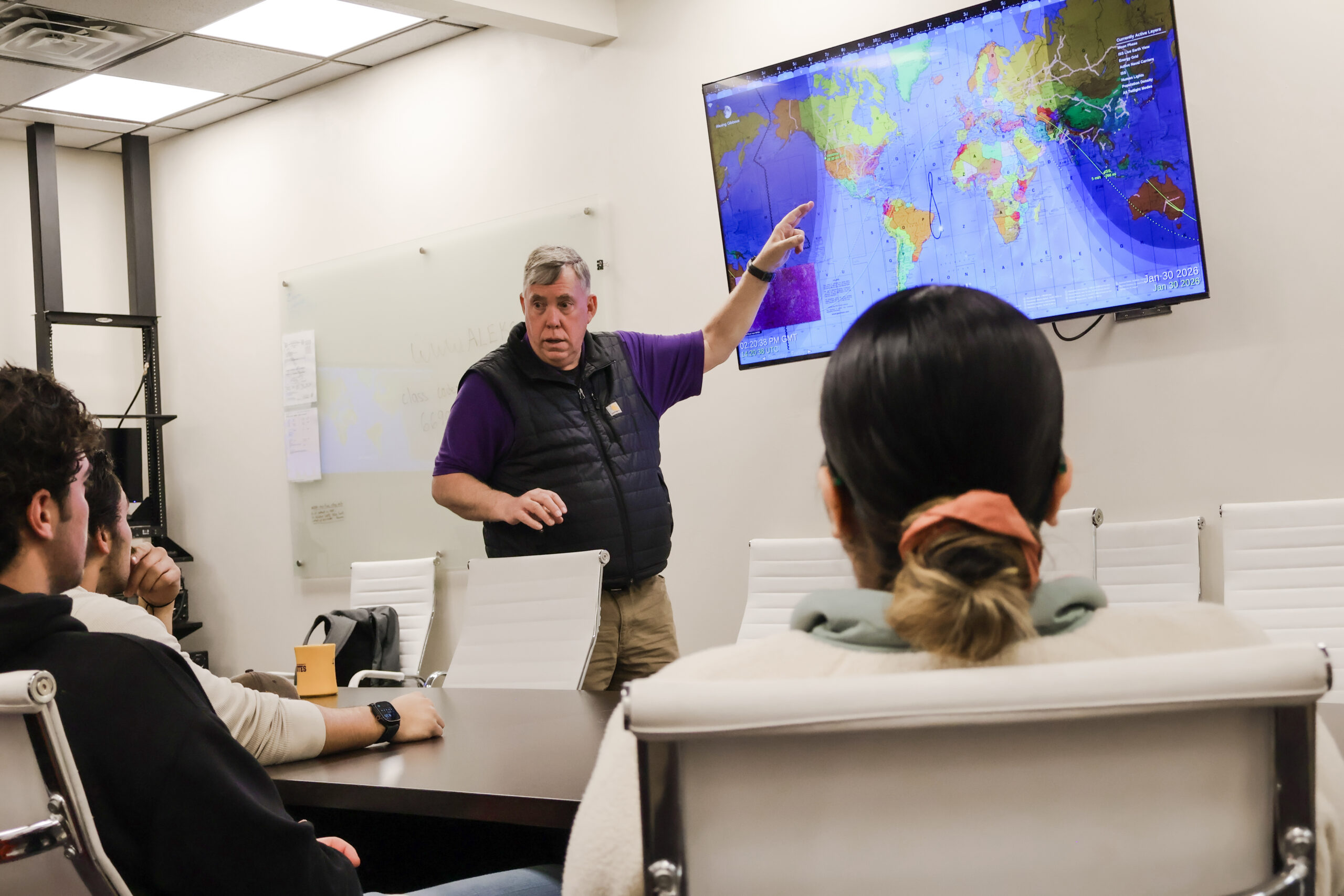 Instructor points to map in EOC