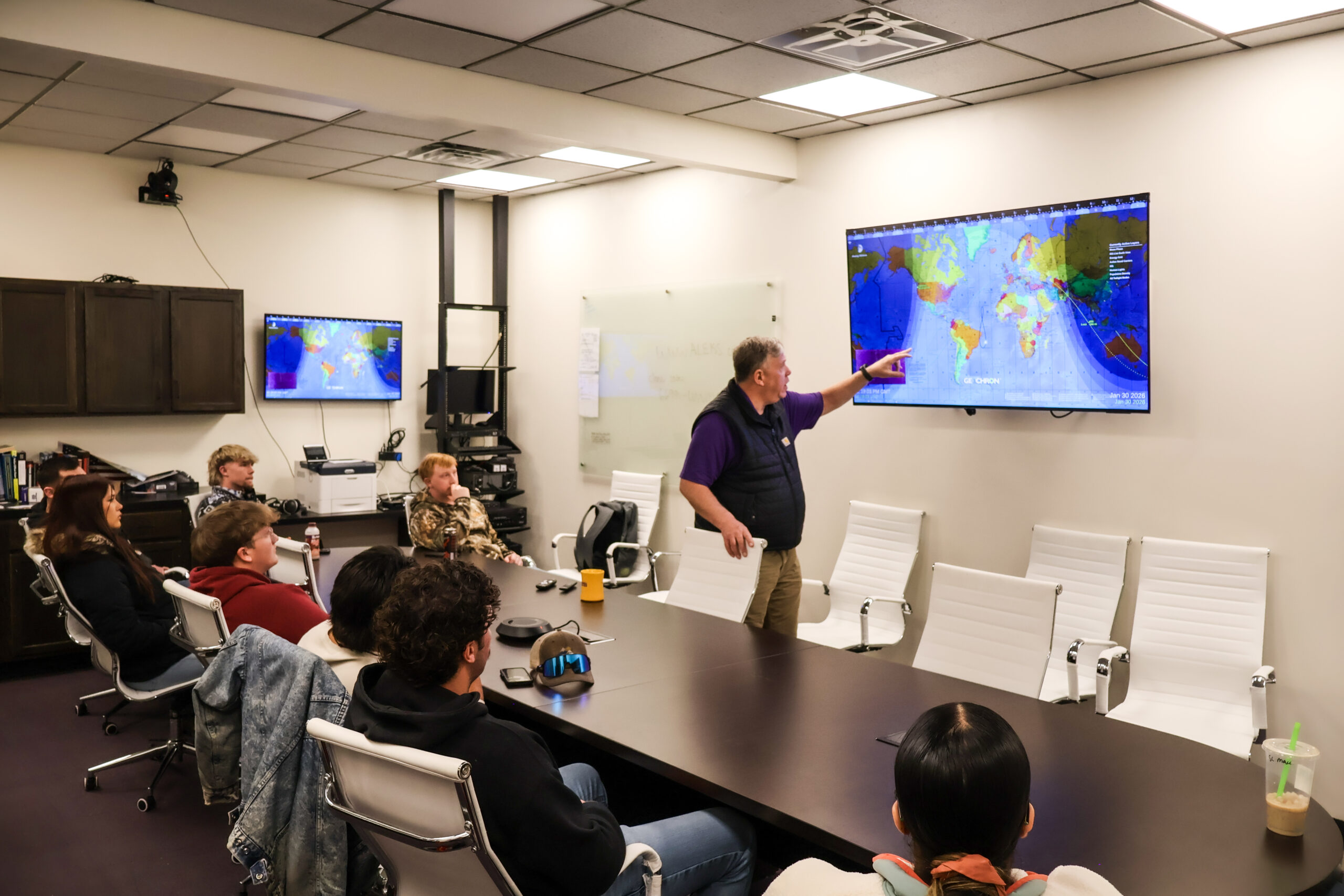 Wide shot of Students and instructor in EOC