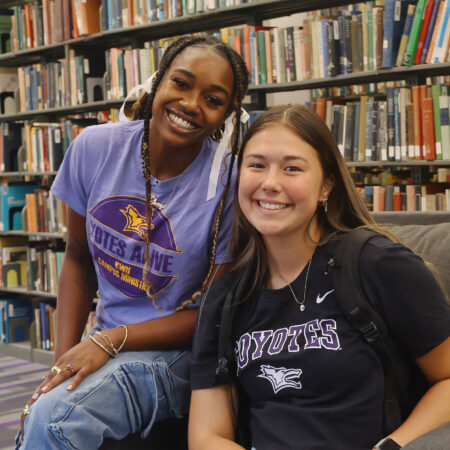 Two students in library
