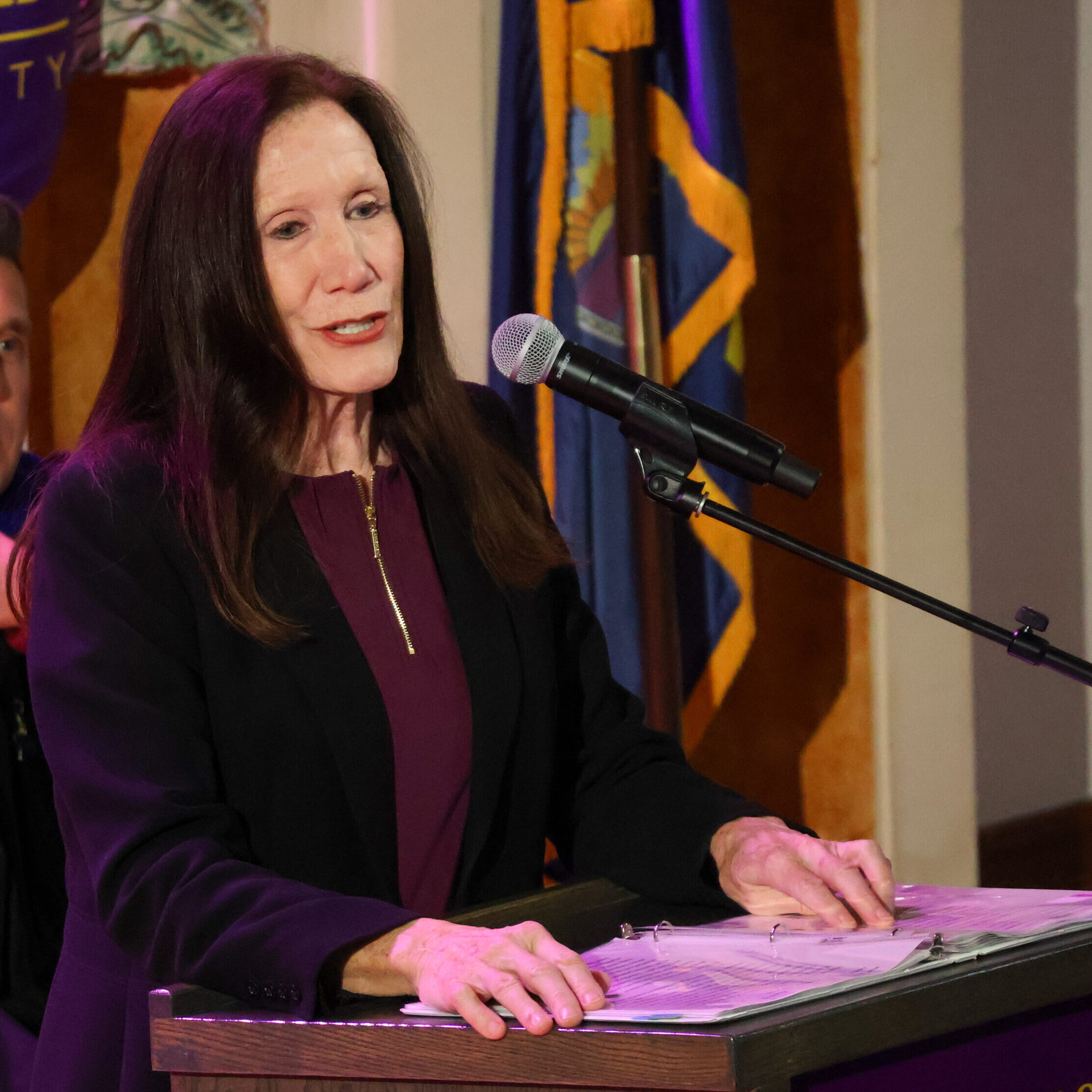 Woman speaking at podium