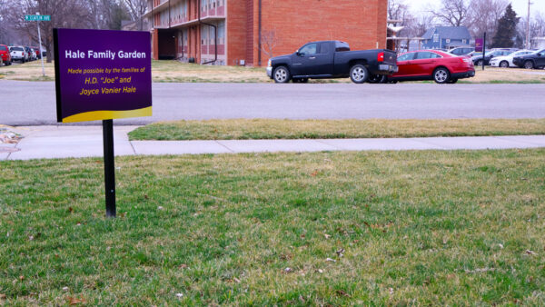 Sign on outdoor green space