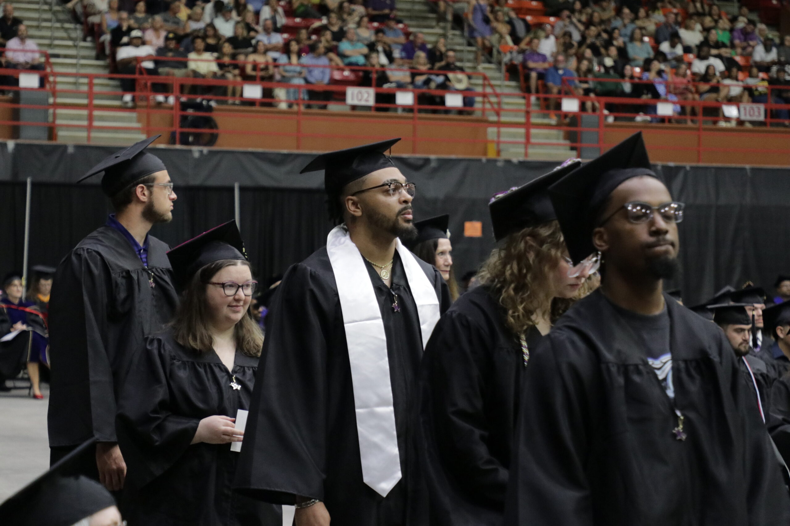 Graduates walking in to ceremony
