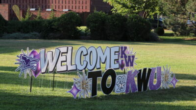 Welcome sign outside building