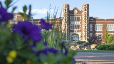 Flowers in front of Pioneer Hall