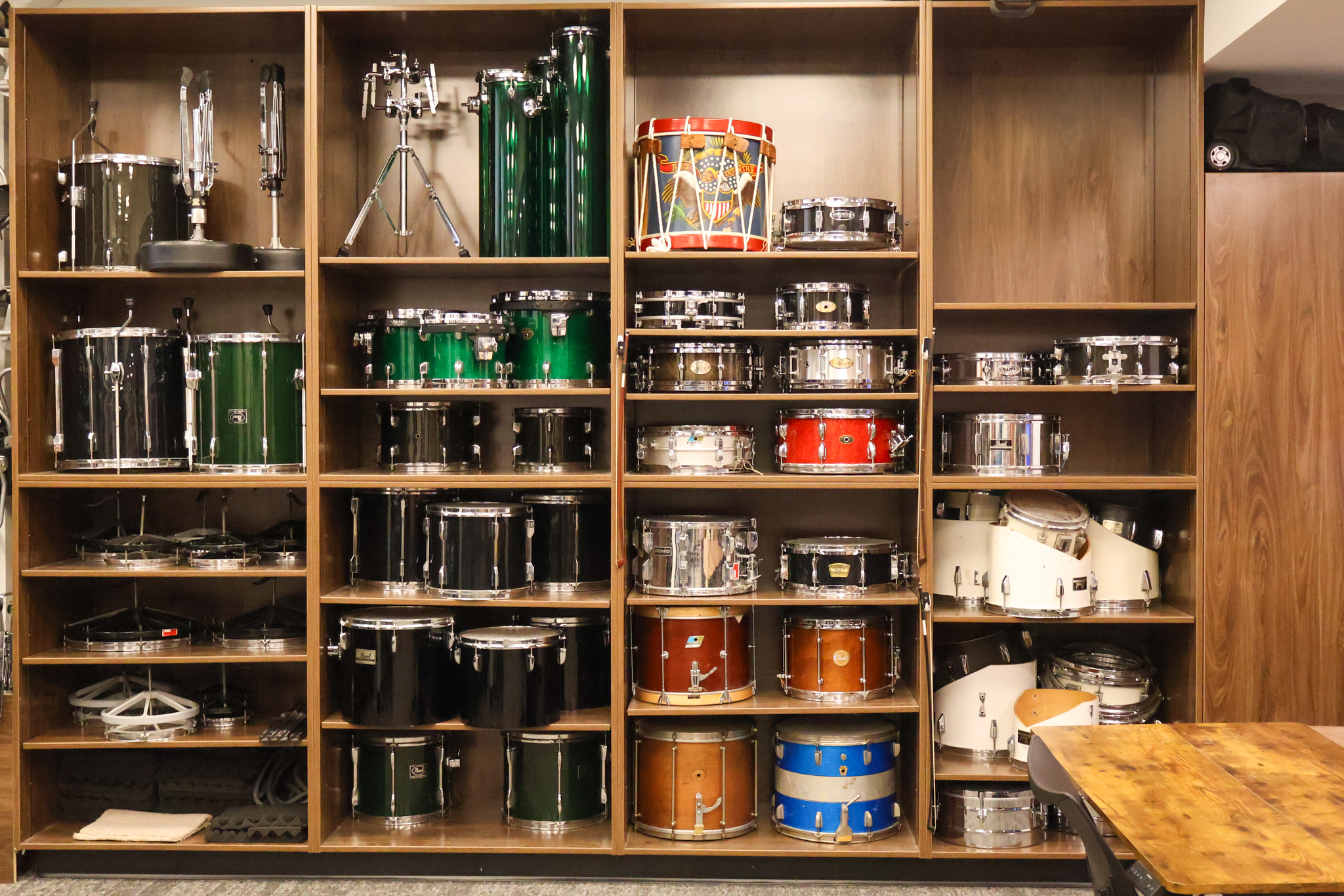 Closeup of drums stored in music center.