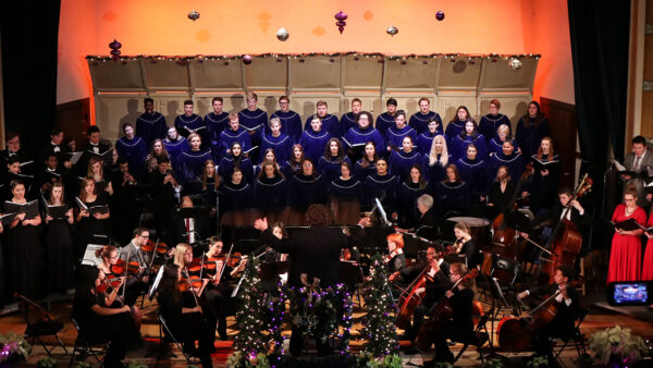 Students in orchestra performing