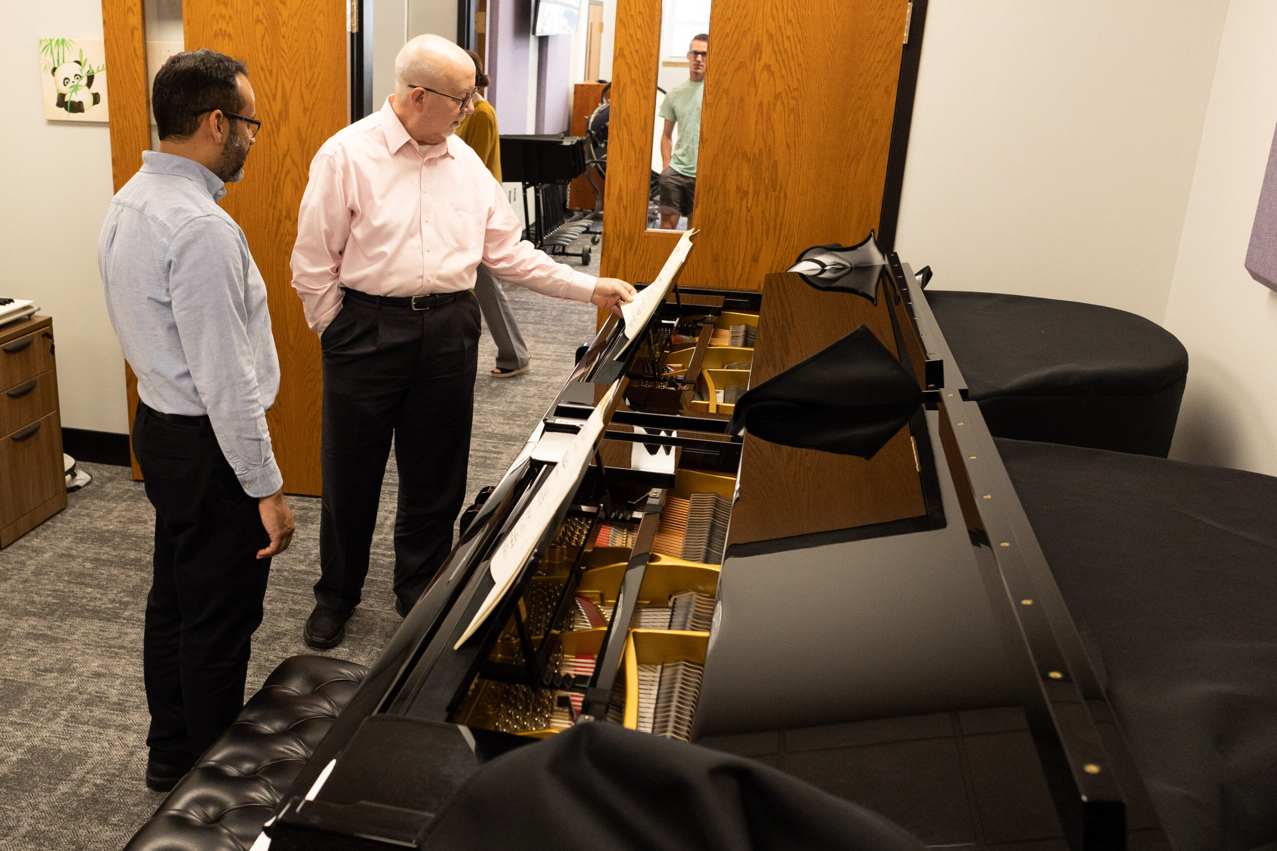 People touring music center.