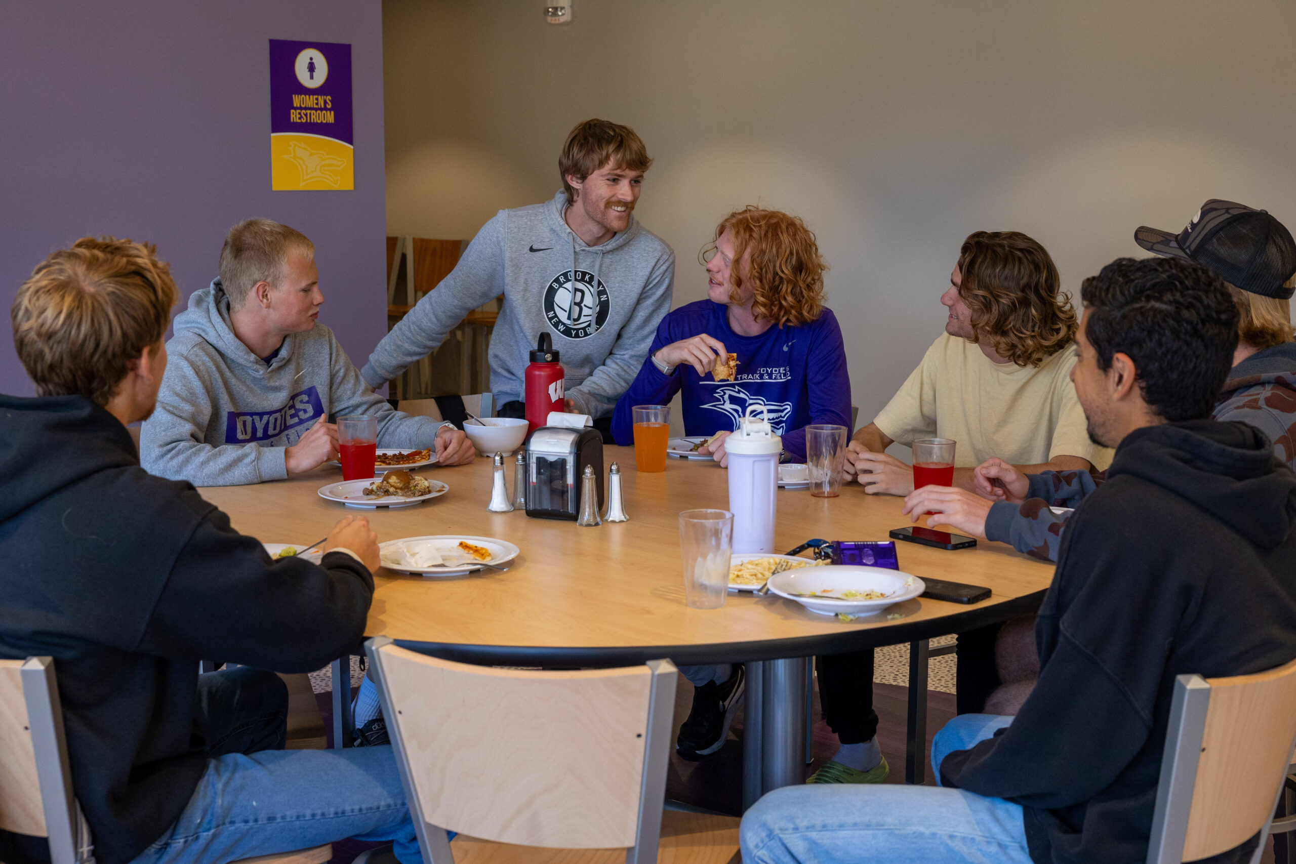Students at table in dining hall