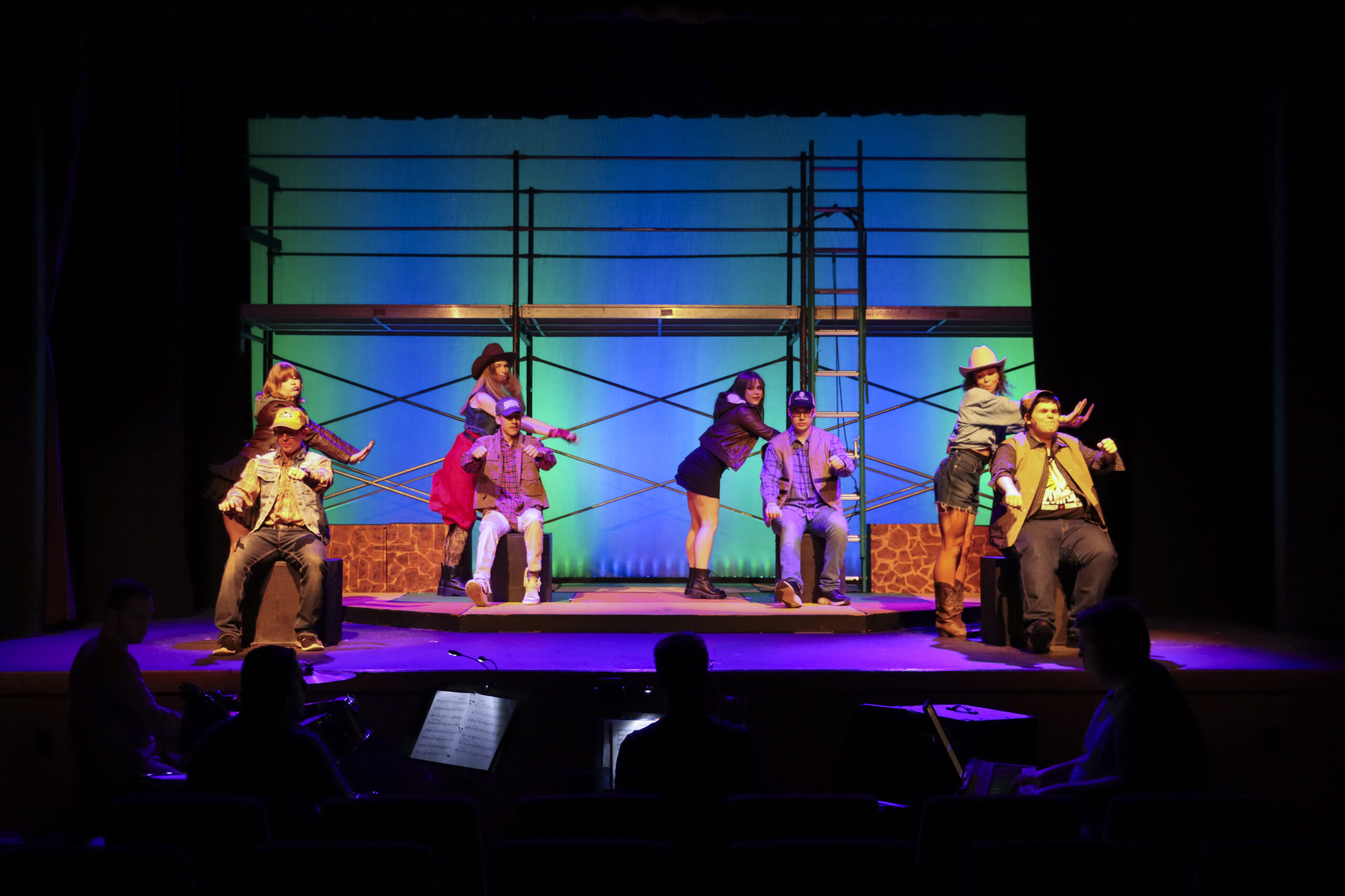 Theatre students performing on stage