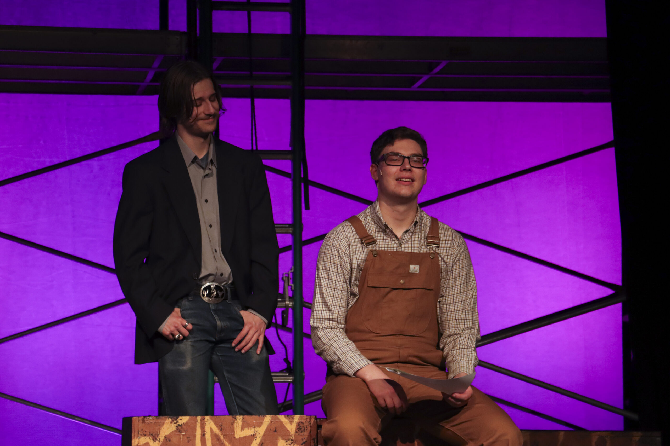 Two students on stage during Working musical